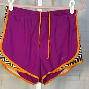 Nike Women's Vibrant Purple Shorts with Orange Accents